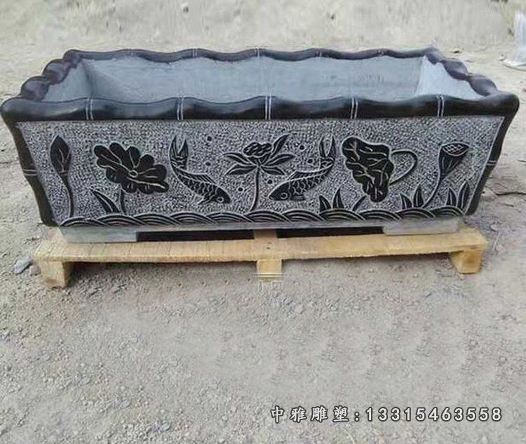 青石花型鱼缸雕塑